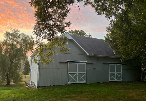 flower farm barn at sunset